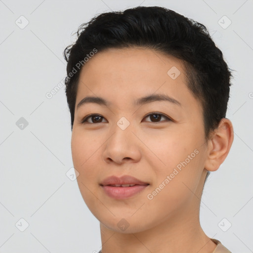 Joyful asian young-adult female with short  black hair and brown eyes