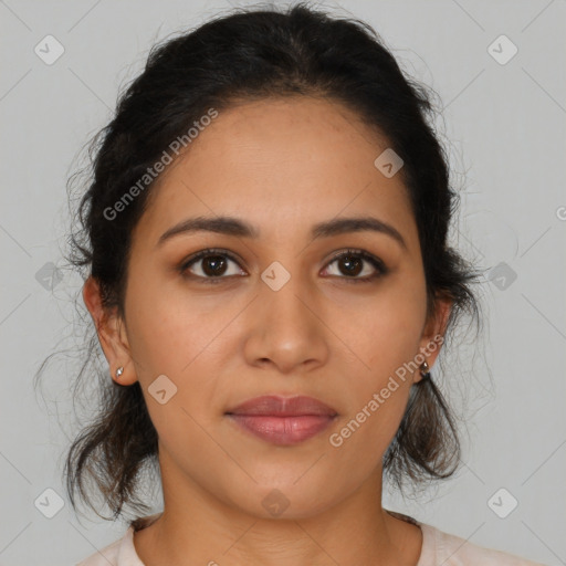 Joyful latino young-adult female with medium  brown hair and brown eyes