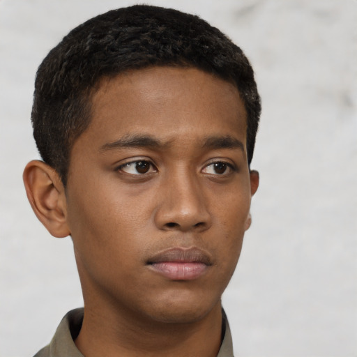 Neutral black young-adult male with short  brown hair and brown eyes