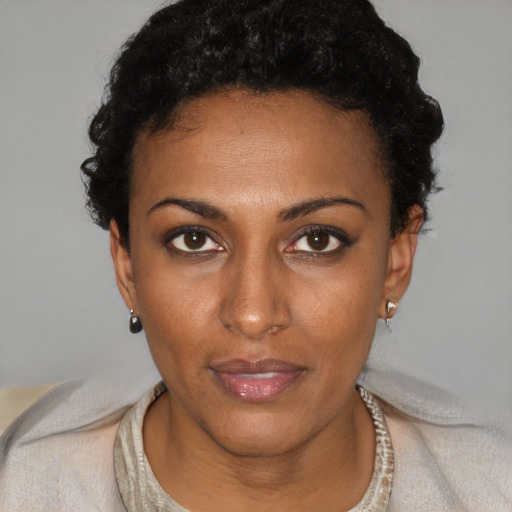 Neutral black young-adult female with short  black hair and brown eyes