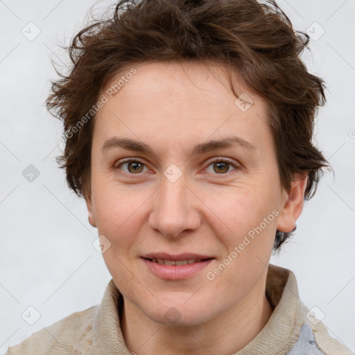 Joyful white adult female with short  brown hair and brown eyes