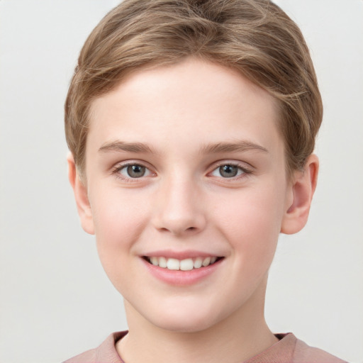 Joyful white child female with short  brown hair and grey eyes