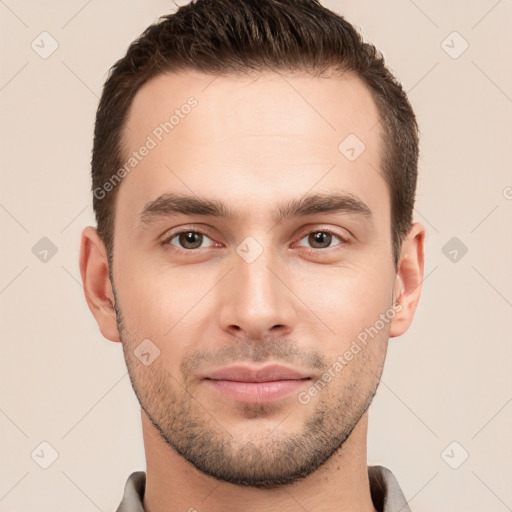 Joyful white young-adult male with short  brown hair and brown eyes