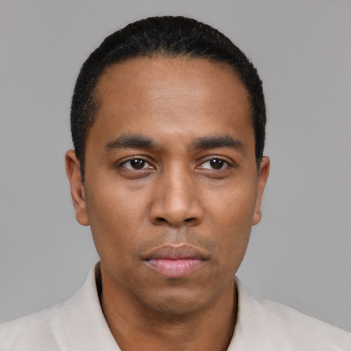 Neutral black young-adult male with short  black hair and brown eyes