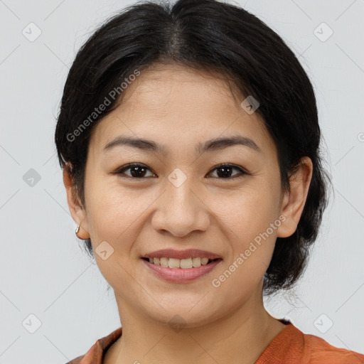Joyful asian young-adult female with medium  brown hair and brown eyes