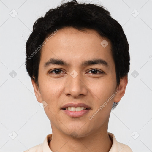 Joyful asian young-adult male with short  black hair and brown eyes