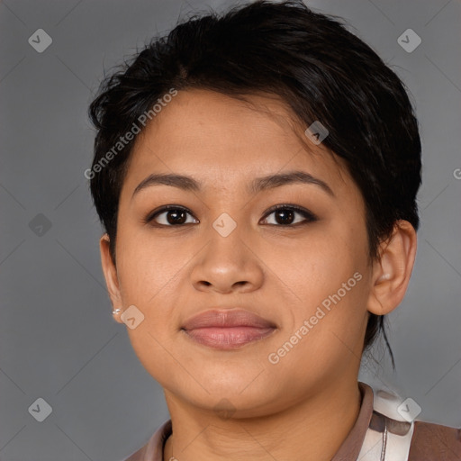 Joyful asian young-adult female with short  brown hair and brown eyes