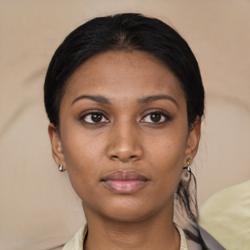 Neutral latino young-adult female with medium  black hair and brown eyes