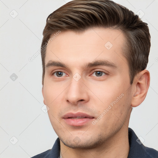 Neutral white young-adult male with short  brown hair and brown eyes