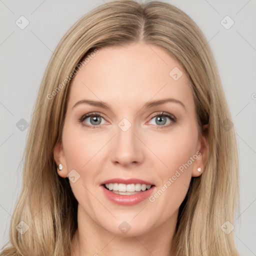 Joyful white young-adult female with long  brown hair and grey eyes