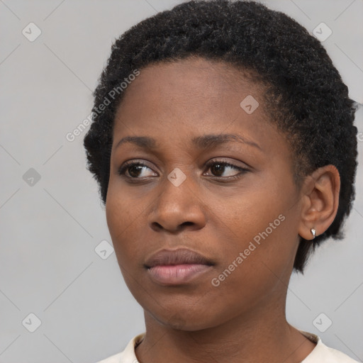 Neutral black young-adult female with short  black hair and brown eyes