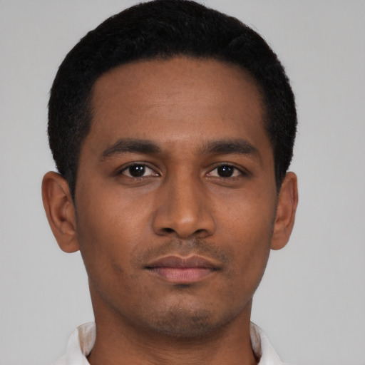 Neutral latino young-adult male with short  black hair and brown eyes