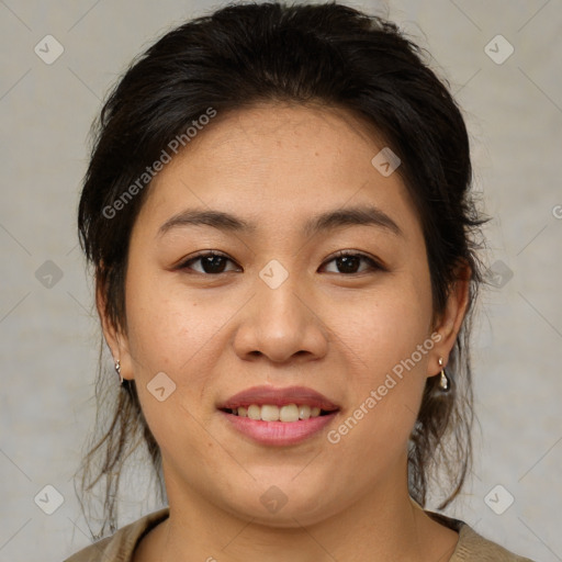 Joyful asian young-adult female with medium  brown hair and brown eyes