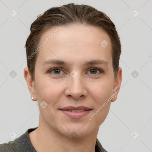 Joyful white young-adult female with short  brown hair and grey eyes