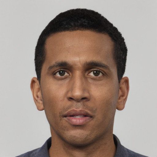 Neutral black young-adult male with short  black hair and brown eyes