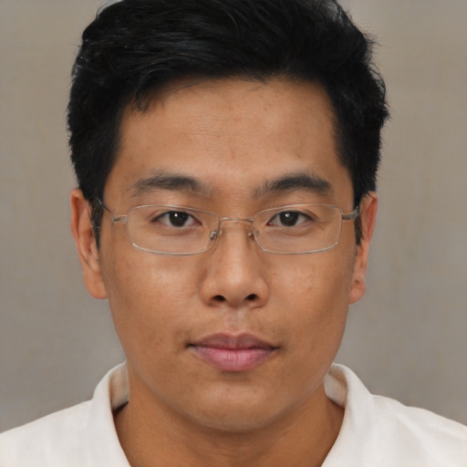 Neutral asian adult male with short  brown hair and brown eyes