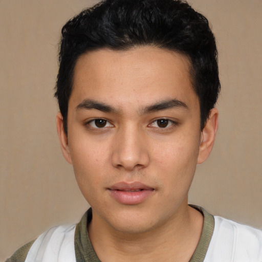 Neutral white young-adult male with short  black hair and brown eyes