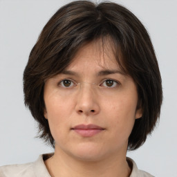 Neutral white adult female with medium  brown hair and brown eyes