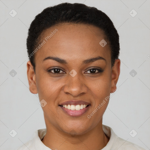 Joyful latino young-adult female with short  black hair and brown eyes