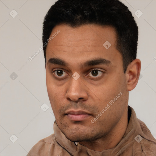 Neutral latino young-adult male with short  black hair and brown eyes