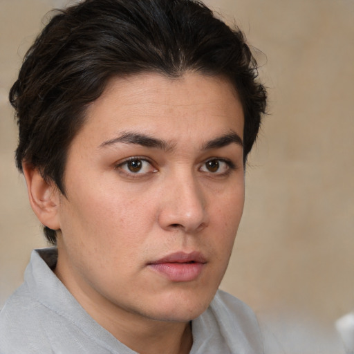 Neutral white young-adult female with short  brown hair and brown eyes