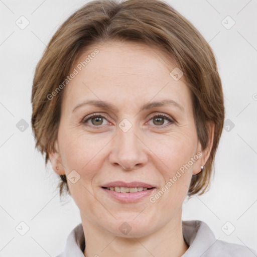 Joyful white adult female with medium  brown hair and grey eyes