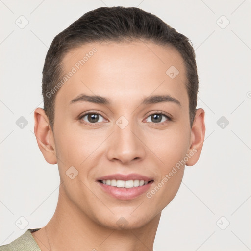 Joyful white young-adult female with short  brown hair and brown eyes