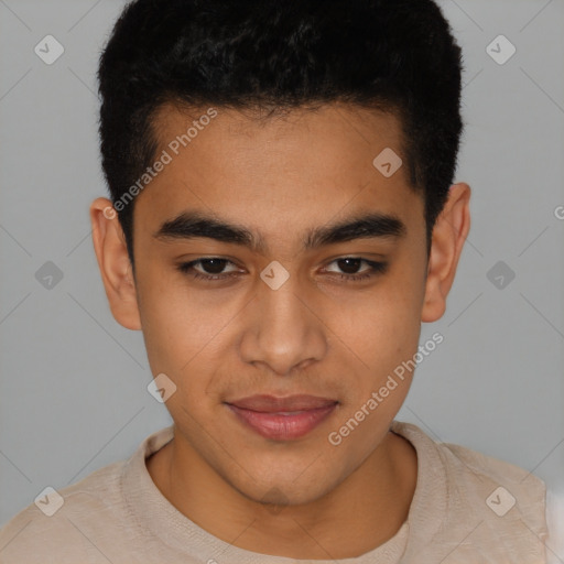 Joyful latino young-adult male with short  black hair and brown eyes