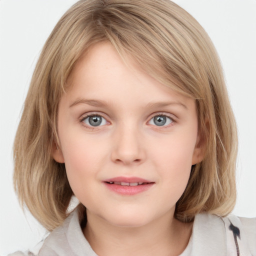 Joyful white child female with medium  brown hair and blue eyes