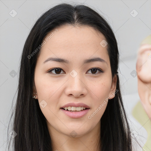 Joyful asian young-adult female with long  brown hair and brown eyes