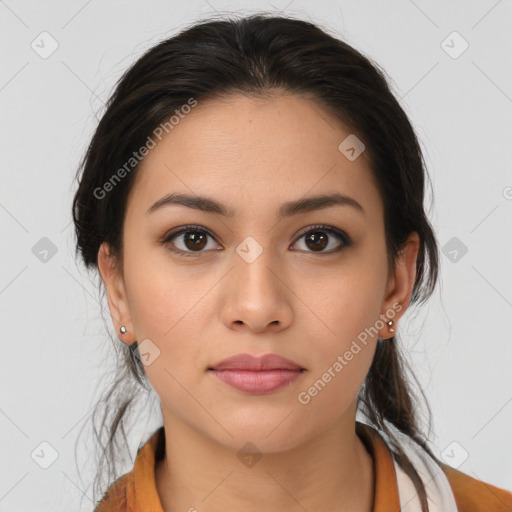 Joyful latino young-adult female with medium  brown hair and brown eyes