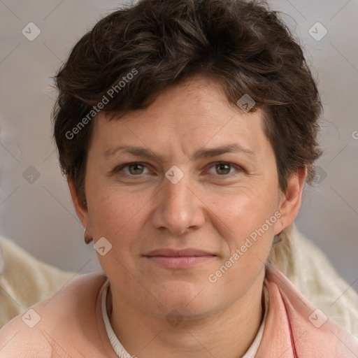 Joyful white adult female with short  brown hair and brown eyes