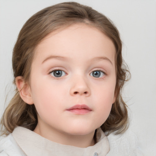 Neutral white child female with medium  brown hair and blue eyes