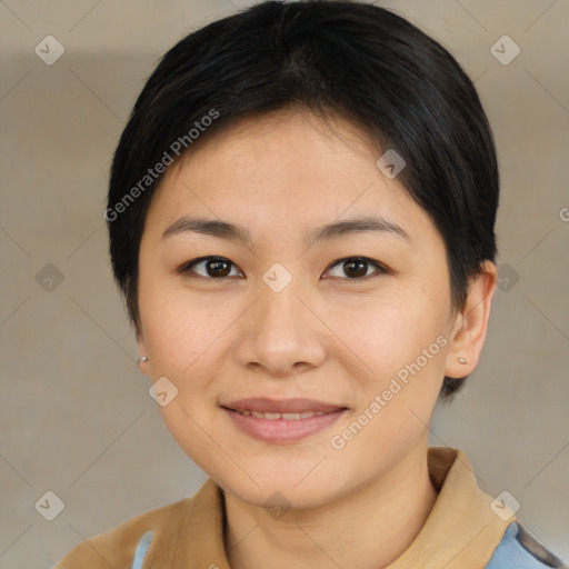 Joyful asian young-adult female with short  brown hair and brown eyes