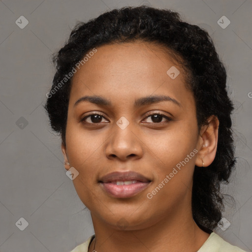 Joyful black young-adult female with medium  black hair and brown eyes