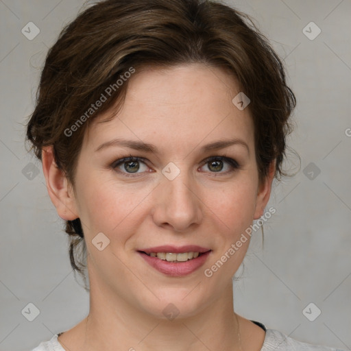 Joyful white young-adult female with medium  brown hair and green eyes