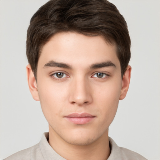 Neutral white young-adult male with short  brown hair and brown eyes