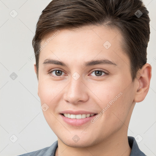 Joyful white young-adult female with short  brown hair and brown eyes