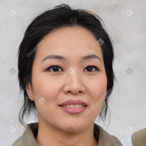 Joyful asian young-adult female with medium  brown hair and brown eyes