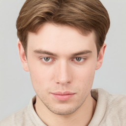 Neutral white young-adult male with short  brown hair and grey eyes