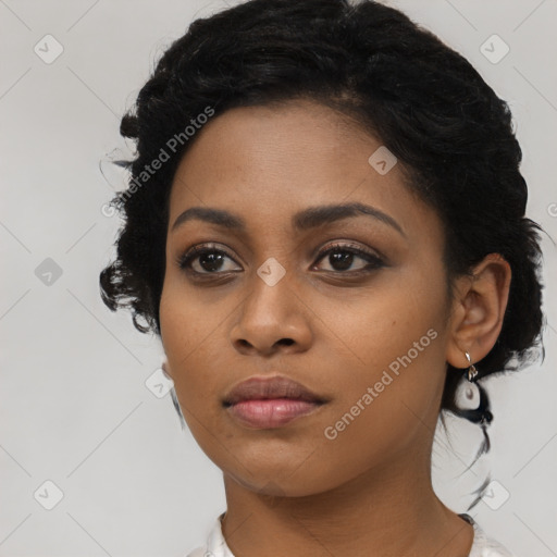 Neutral black young-adult female with medium  black hair and brown eyes