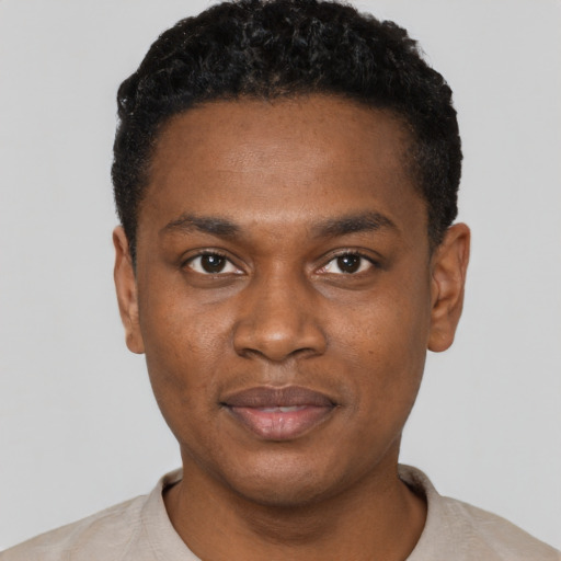 Neutral black young-adult male with short  black hair and brown eyes