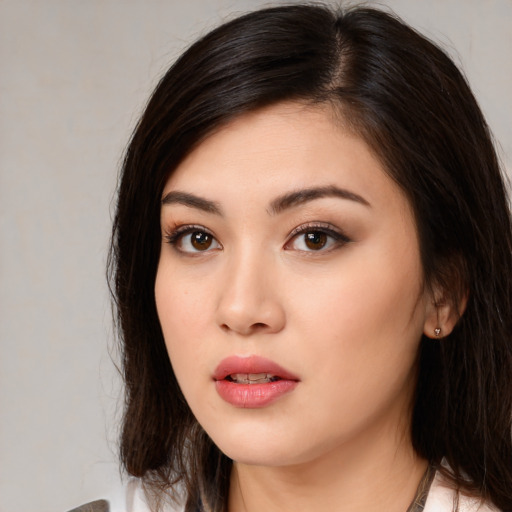 Neutral asian young-adult female with long  brown hair and brown eyes