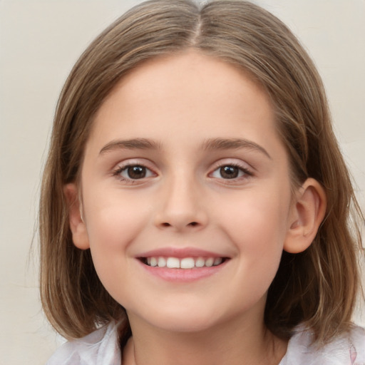 Joyful white child female with medium  brown hair and brown eyes