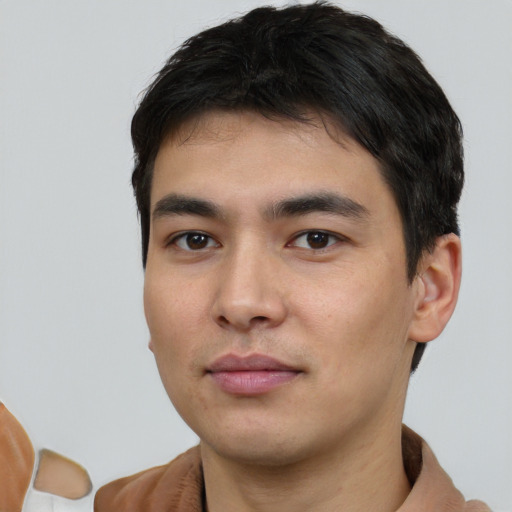 Neutral white young-adult male with short  black hair and brown eyes