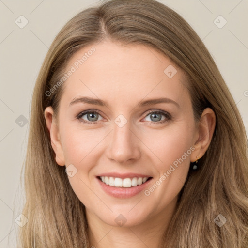 Joyful white young-adult female with long  brown hair and grey eyes