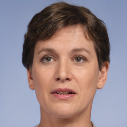 Joyful white adult female with short  brown hair and brown eyes