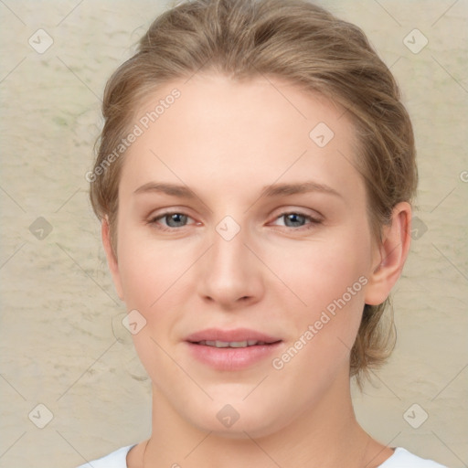 Joyful white young-adult female with medium  brown hair and blue eyes