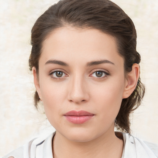 Neutral white young-adult female with medium  brown hair and brown eyes