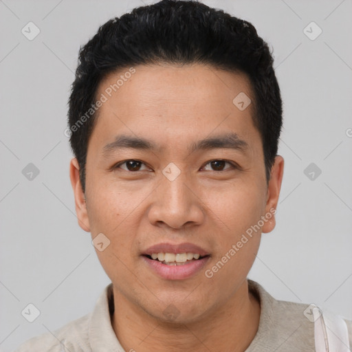 Joyful white young-adult male with short  black hair and brown eyes